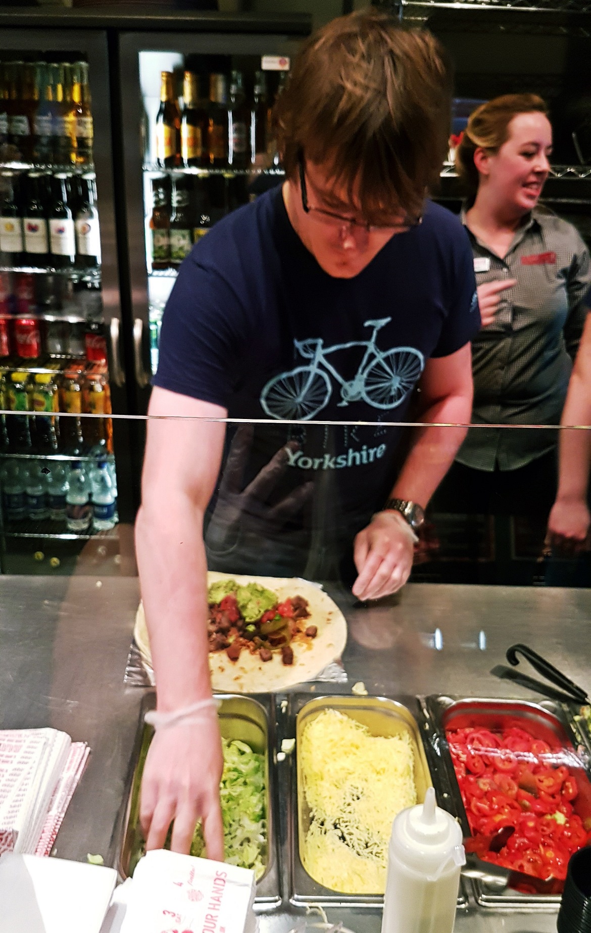 TC grabbing some lettuce - Burrito Masterclass with Barburrito, review by BeckyBecky Blogs