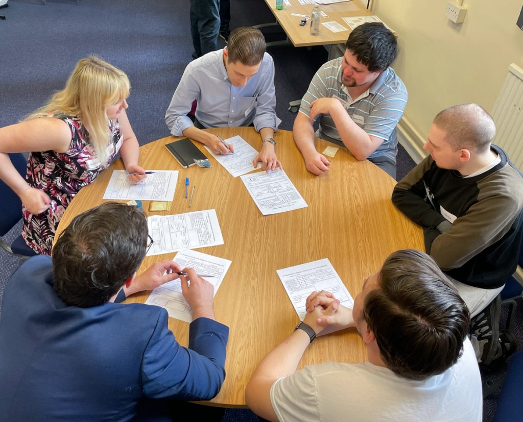 Players including Becky, the Middle Party, Cromwell, the Covenanters and the Scottish Royalists discuss around a table