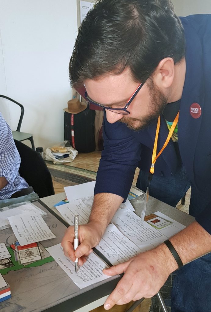 Tromp signing our Letters of Marque - Buccaneer Megagame After Action Report by BeckyBecky Blogs