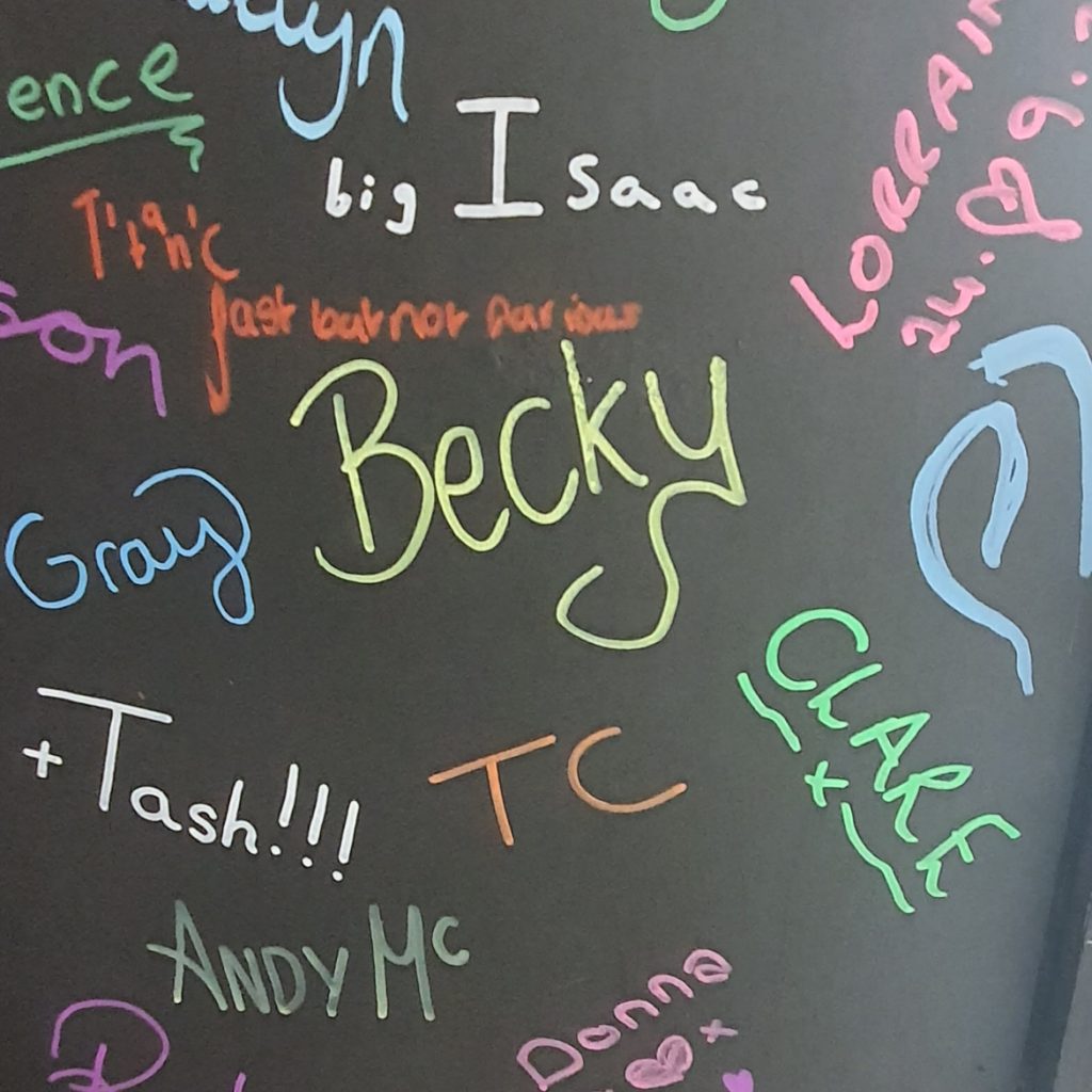 Becky written in yellow and TC written in orange
