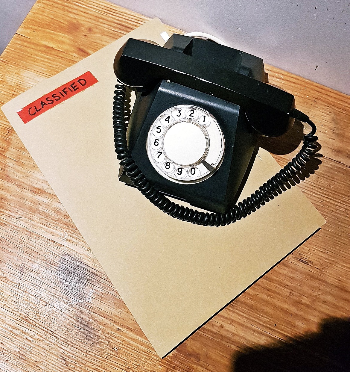 Phone and a confidential folder - Our Finest Hour, escape room by Escape Hunt Leeds, review by BeckyBecky Blogs