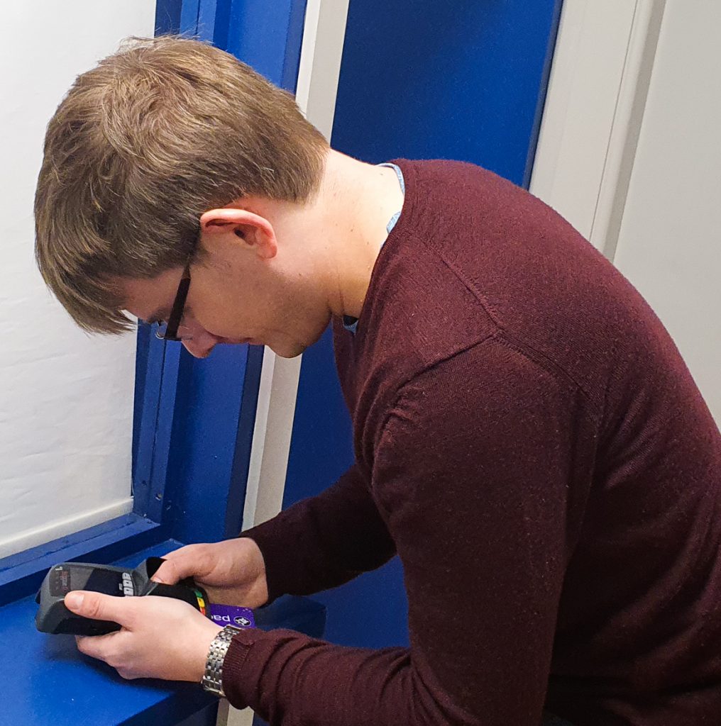 Tim entering a code - Gem Runner escape room by Lucardo Manchester, review by BeckyBecky Blogs