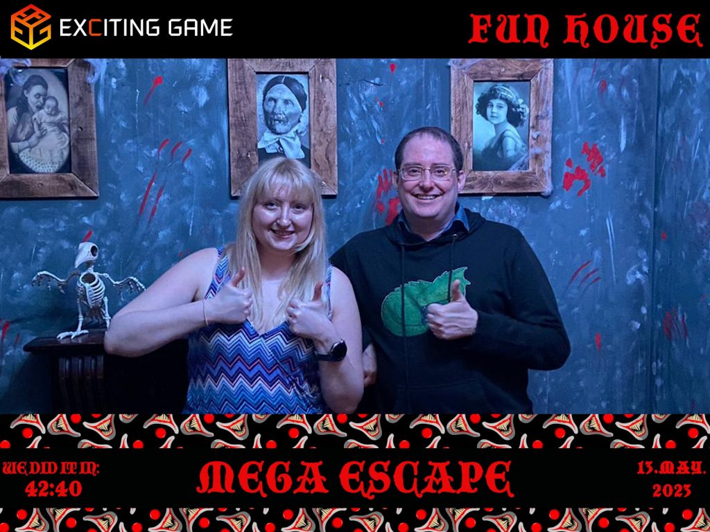 Becky and Ed smiling and giving a thumbs up in their success photo, with a frame saying their team name "Mega Escape" and "We Did It In 42:40"