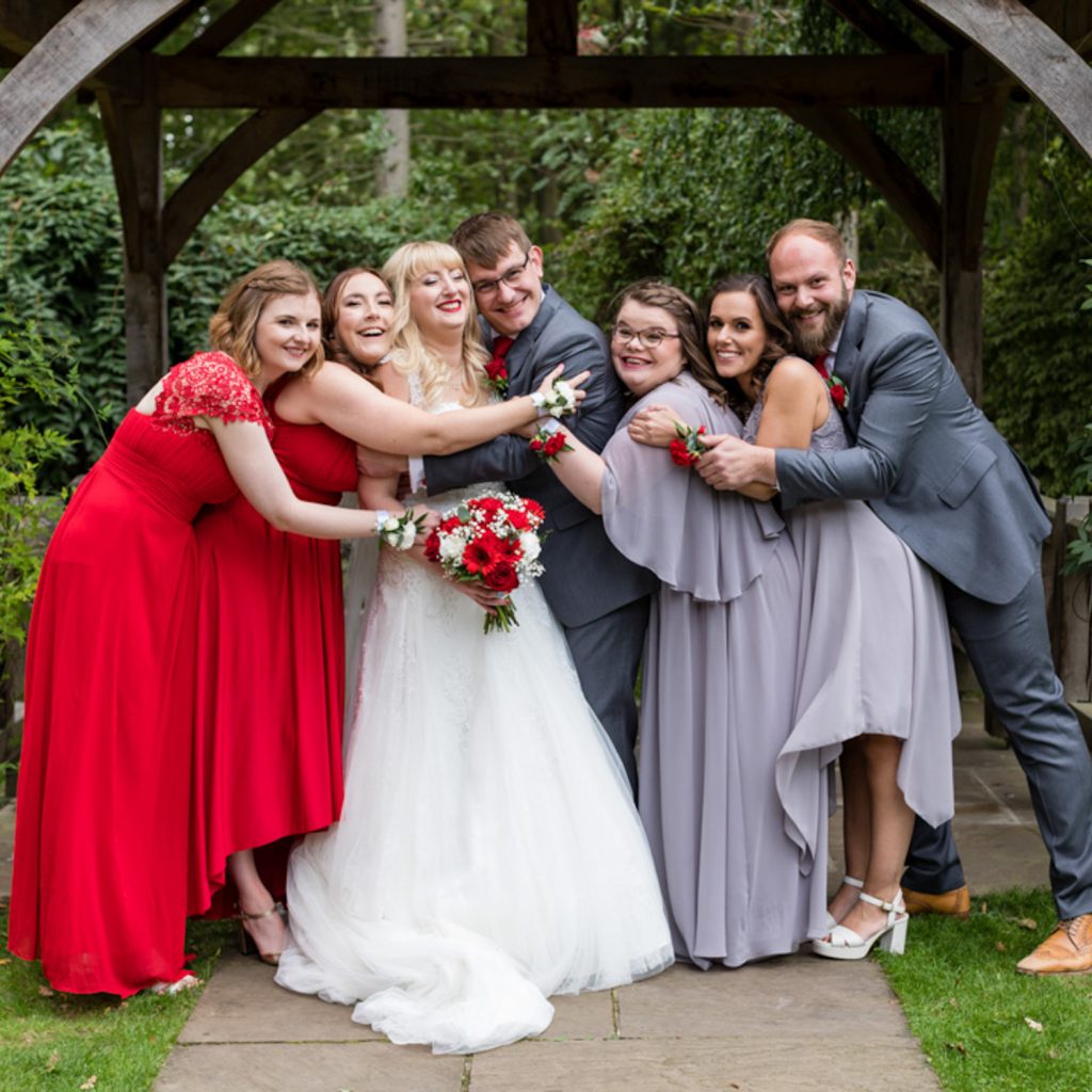 Becky and Tim's Control Team hugging them