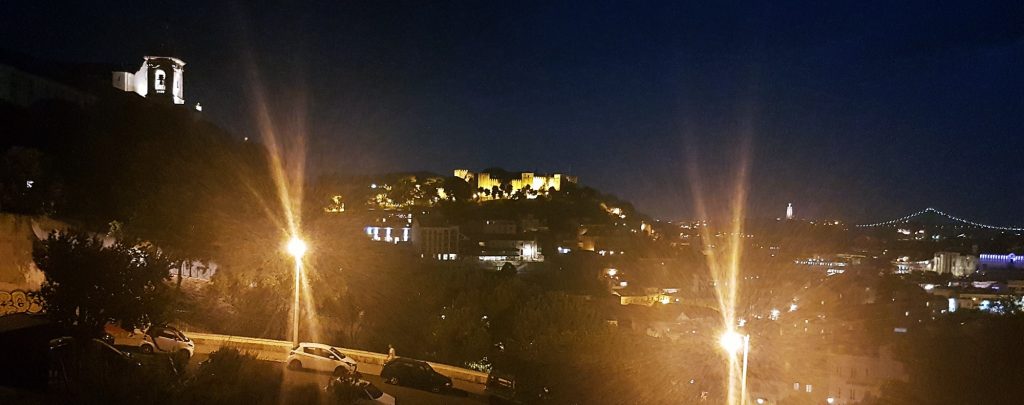 Night time view across Lisbon towards Castelo de Sao Jorge from Jardim da Cerca da Graca - Things to Do in Lisbon, Portgual, travel blog by BeckyBecky Blogs