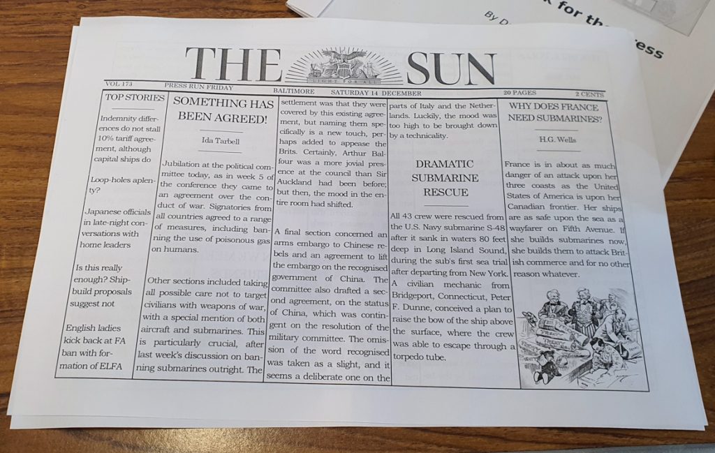 A megagame paper of the Baltimore Sun, with headlines: "Something Has Been Agreed!", "Dramatic Submarine Rescue" and "Why Does France Need Submarines?"