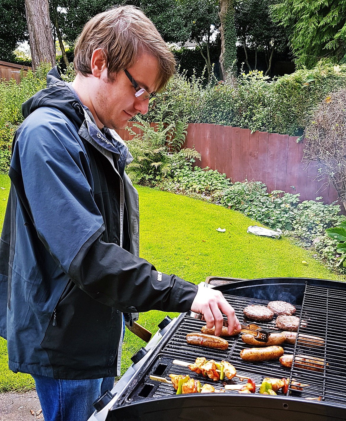 Tim cooking on the BBQ - September Monthly Recap by BeckyBecky Blogs