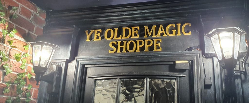 Ye Olde Magic Shoppe sign above a door