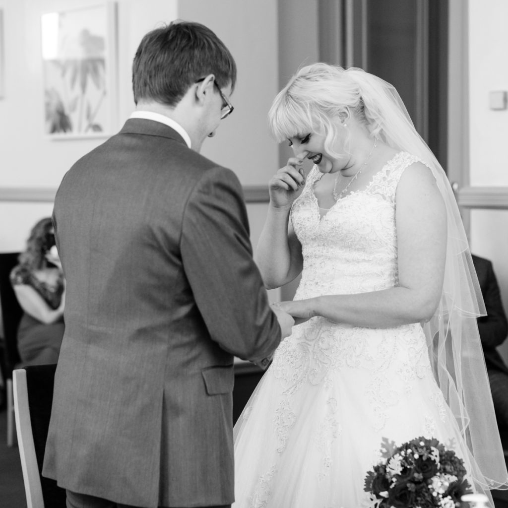 Exchanging rings at our wedding ceremony - Achievement Unlocked: Married by BeckyBecky Blogs