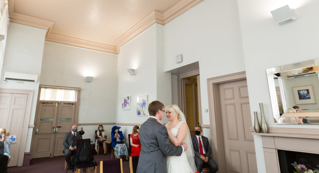 Saying our vows at our wedding ceremony - Achievement Unlocked: Married by BeckyBecky Blogs