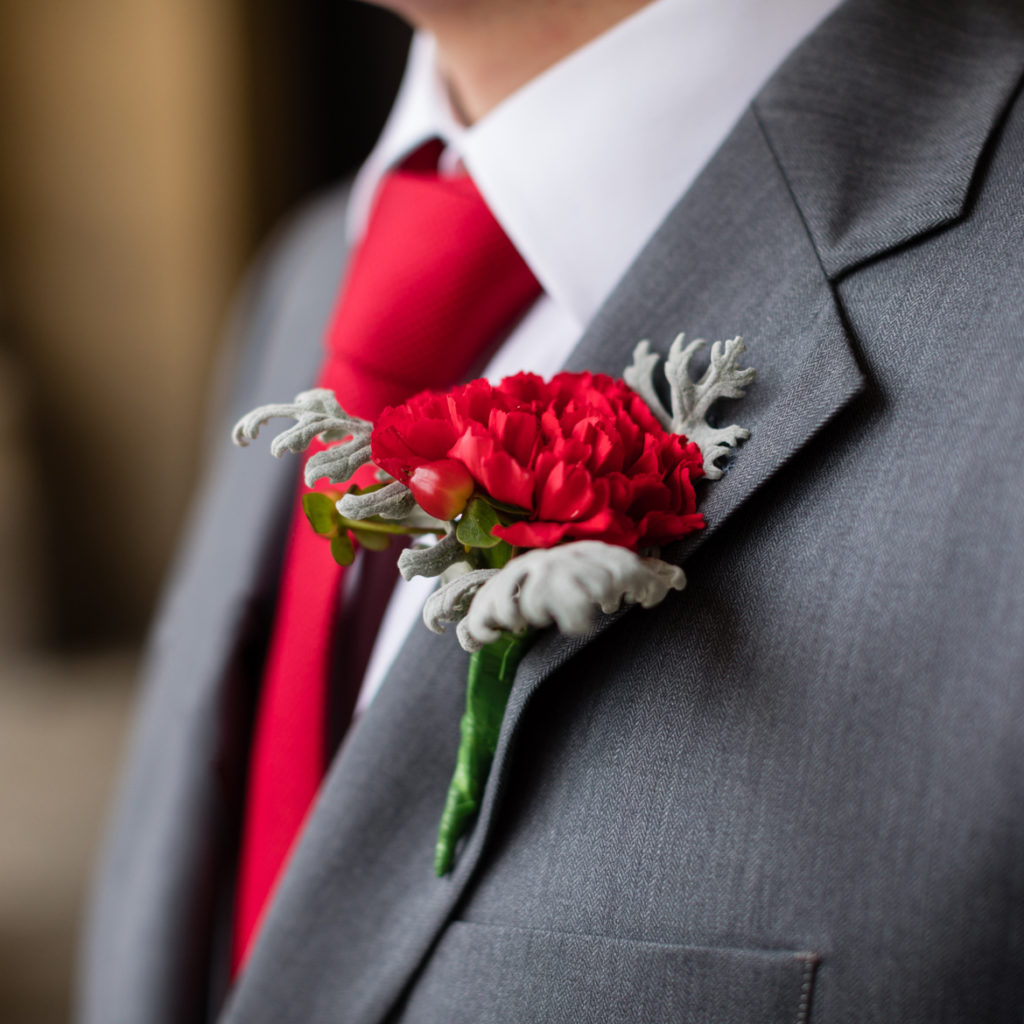 Tim's red carnation buttonhole